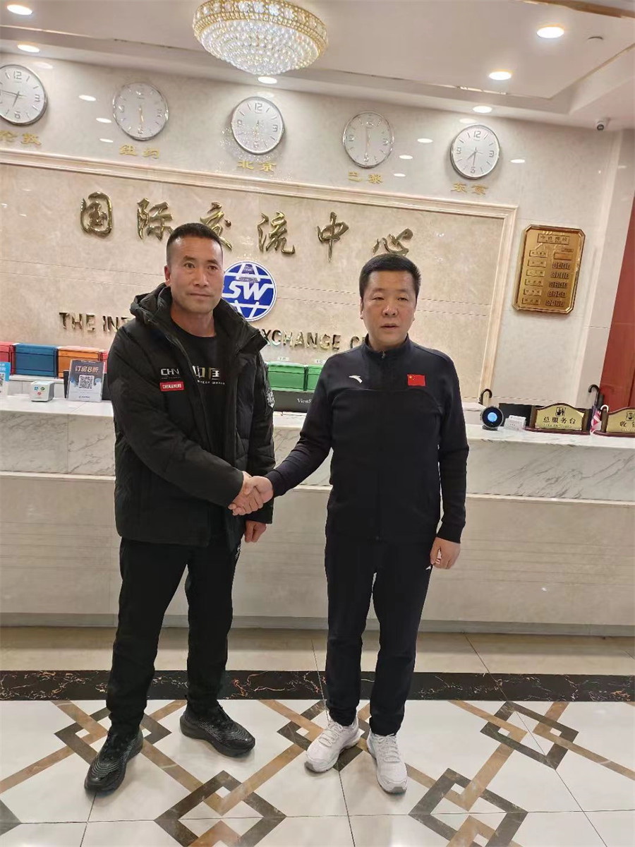 中国武术散打协会主席温剑博与中国武术协会副主席田苏辉